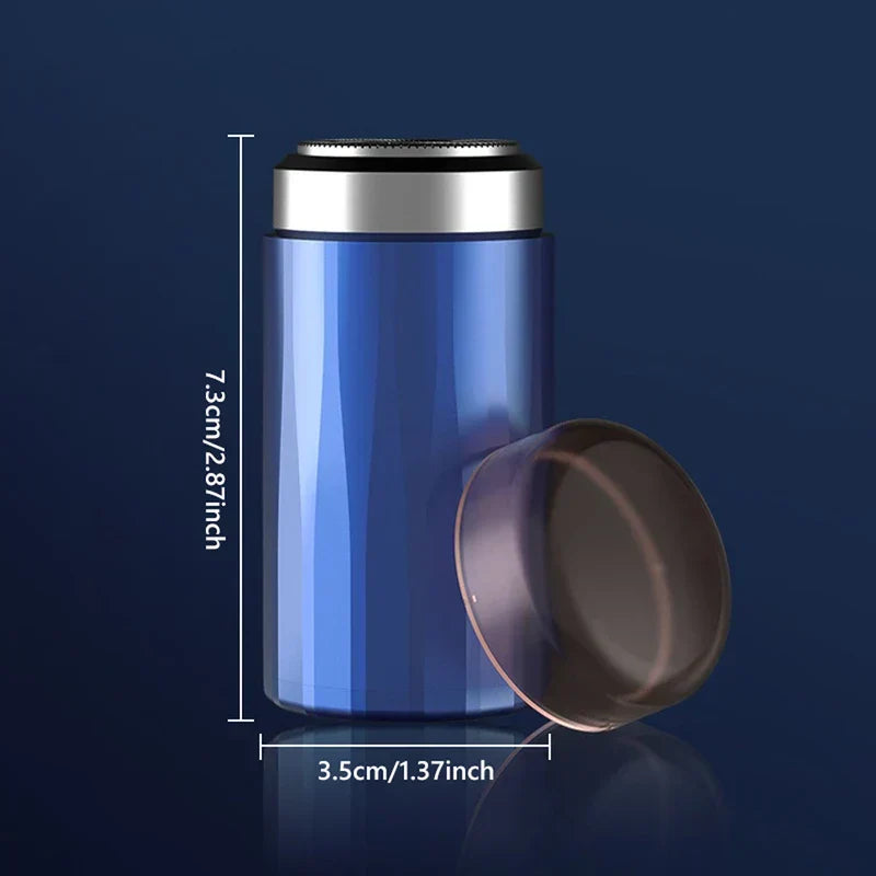 Blue mini electric shaver with transparent cover removed, showing height 7.3cm and width 3.5cm dimensions.