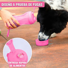 Person pours water from a pink portable water bottle dispenser for a black and white dog; inset shows 2.5cm food outlet