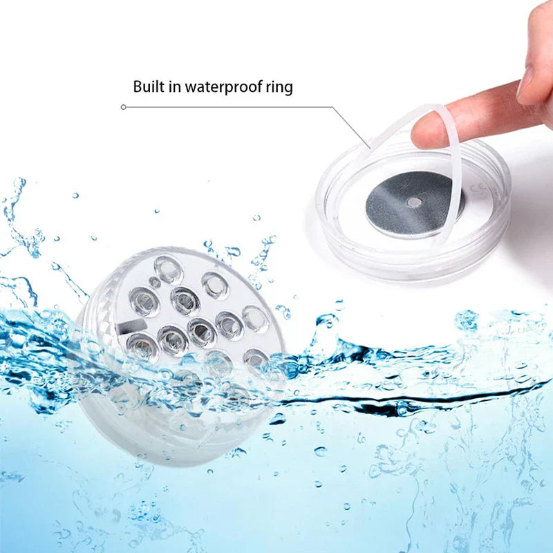 Waterproof camping lantern with built-in waterproof ring detail, shown partially submerged in splashing water