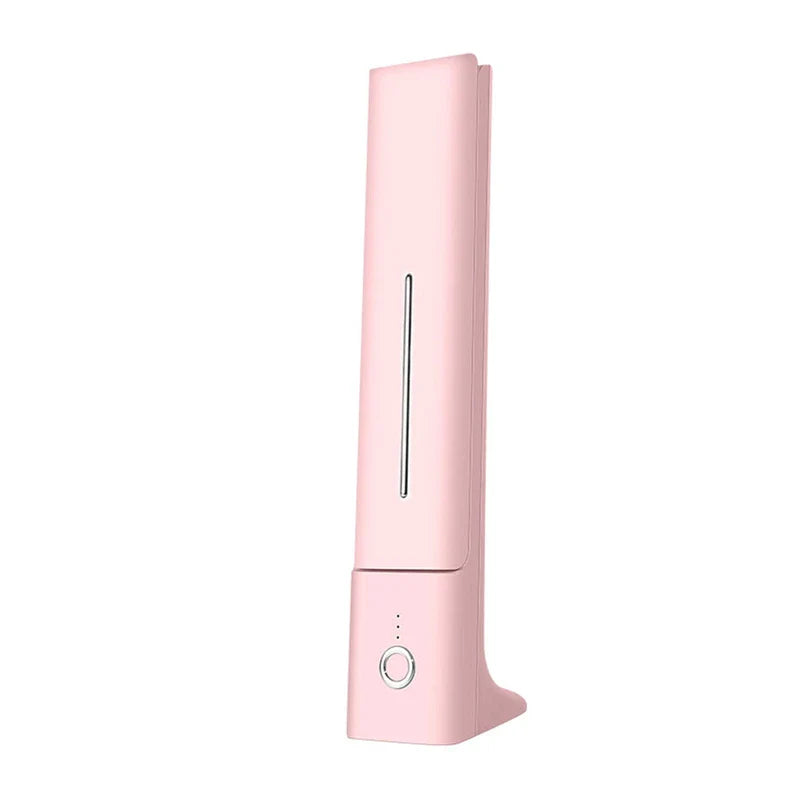 Pastel pink folded led desk lamp on a white background, with a base button and small status dots.