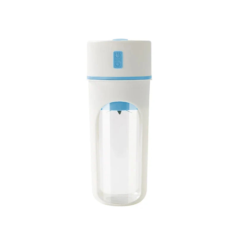 A white and blue blender juicer cup stands against a plain white background with a visible internal blade.