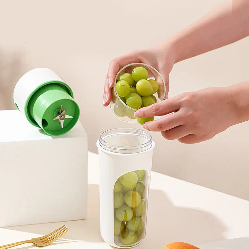 Compact portable blender juicer cup in a kitchen setting