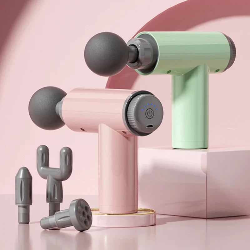 herramienta de masaje muscular corporal vibratoria - herramienta portátil de masaje muscular corporal vibratoria sobre una mesa