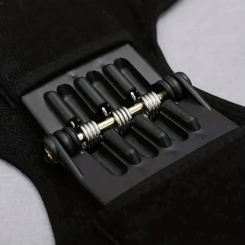 Close-up of the spring-loaded support component of power knee stabilizer pads