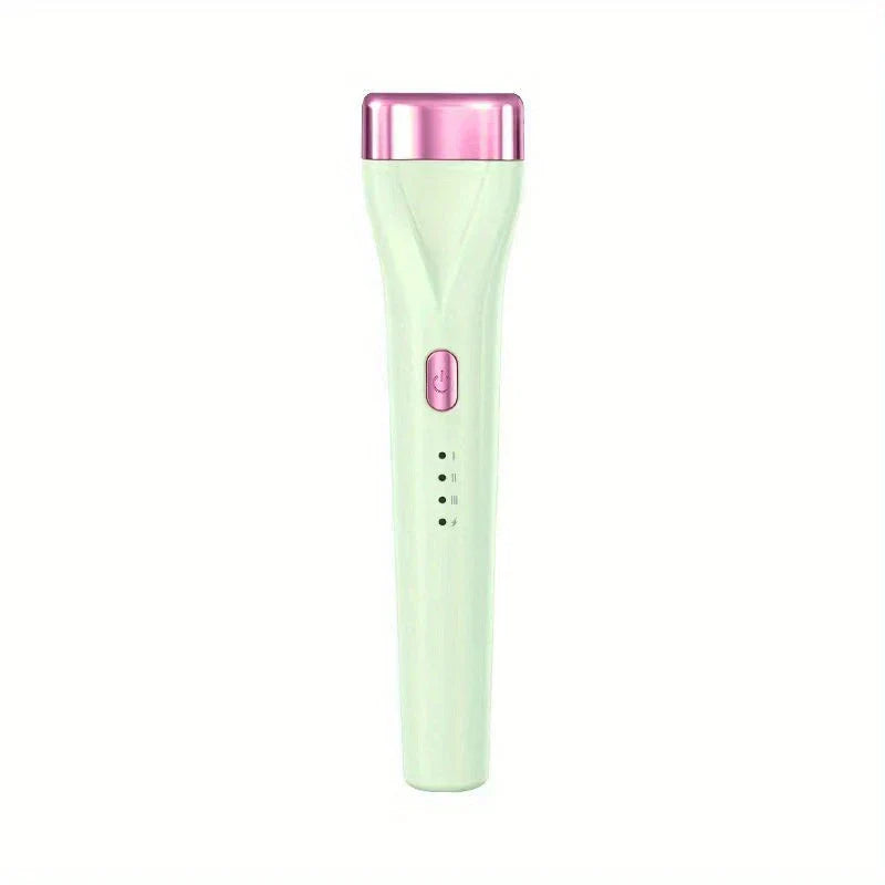 Light green precision eyelash curler with pink accents and indicator lights