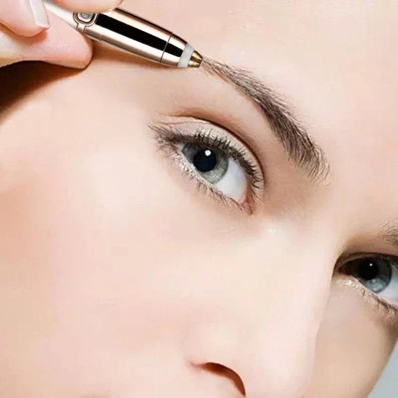 Close-up of hair cut shaper being used to trim eyebrow hair near a person's eye