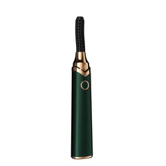 Dark green gold rechargeable heated eyelash curler on white background