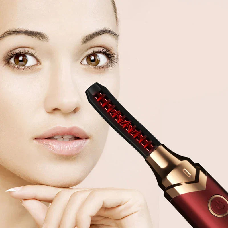 Red gold heated eyelash curler near woman's face showing curled lashes