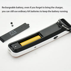 Hair clipper trimmer with open battery compartment showing a yellow battery, black battery cover placed beside it on white background