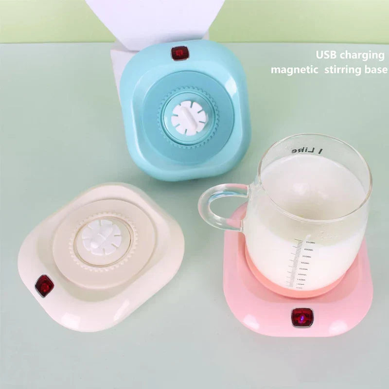 Blue, beige, and pink USB charging magnetic stirring bases with glass protein shaker bottle of milk on pink base