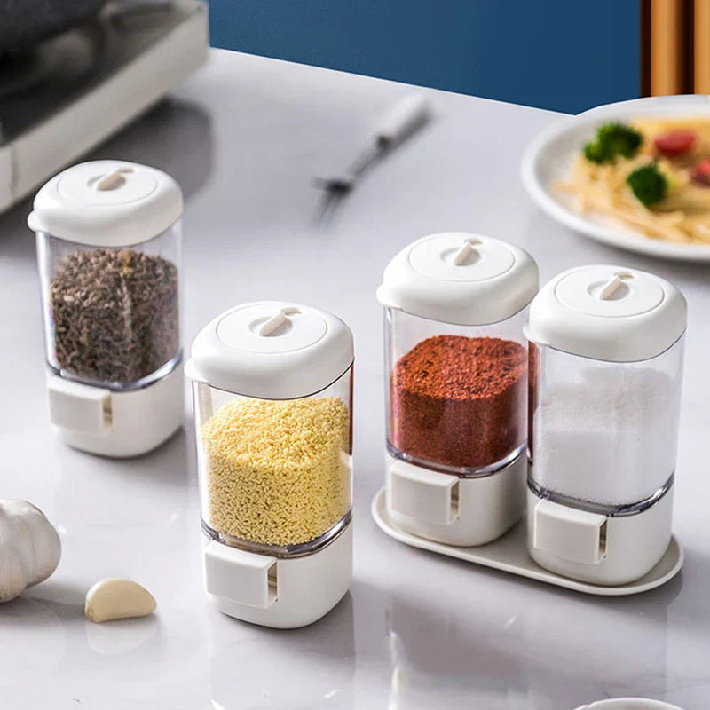 Seasoning jar dispenser set with measured dispensing lids
