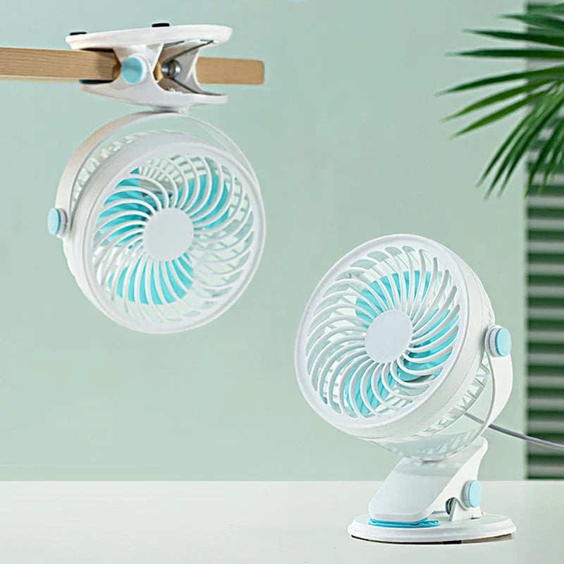 Usb Fan - Two usb fans with clip mounts: one clipped to a wooden rod, one sitting on a white table, against a mint background