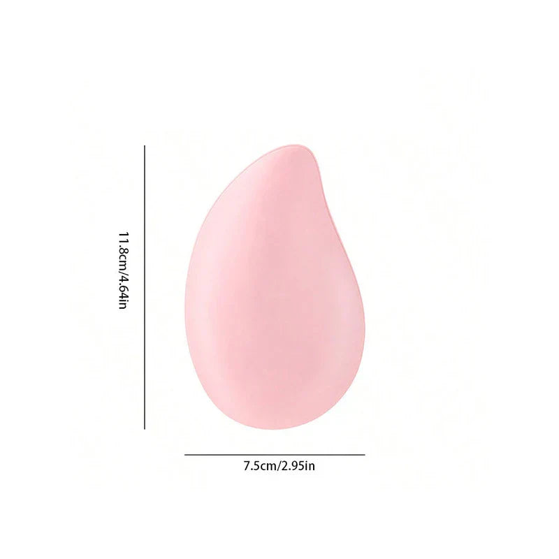 Pink mango-shaped rechargeable hand warmer with height 11.8cm/4.64in and width 7.5cm/2.95in on white background