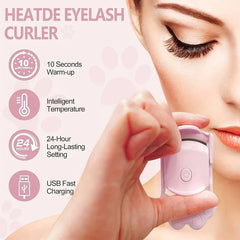 Close-up of heated eyelash curler in use on lashes