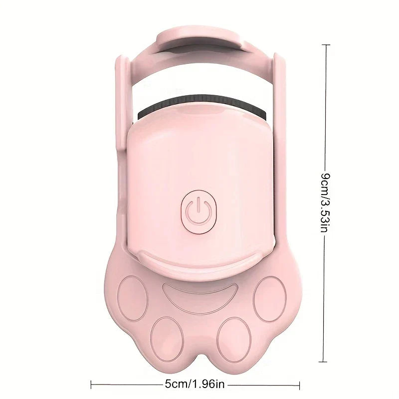 Front view of pink cat paw shaped eyelash curler with 9cm x 5cm size dimension markers on white background