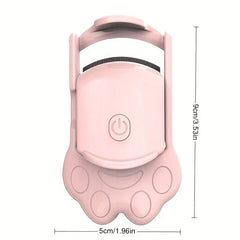 Front view of pink cat paw shaped eyelash curler with 9cm x 5cm size dimension markers on white background