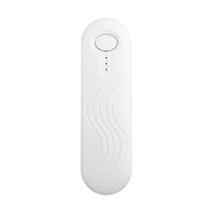 White oval mini bag heat sealer with a top button, three indicator dots, and wavy texture, on a plain white background