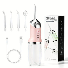 Pink portable water irrigator with four nozzles, USB charging cable, and product box on white background