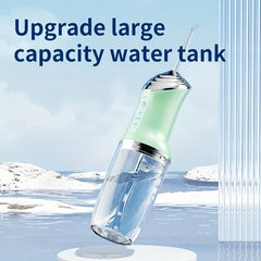 Mint green water irrigator with transparent upgraded large capacity water tank, snowy background