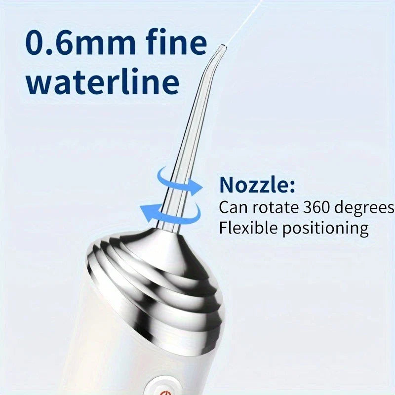 Close-up of a water irrigator nozzle with 0.6mm fine waterline, showing 360-degree rotation indicator