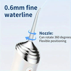 Close-up of a water irrigator nozzle with 0.6mm fine waterline, showing 360-degree rotation indicator