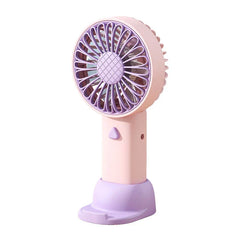 Pink and purple handheld travel fan with a matching base, displayed against a white background