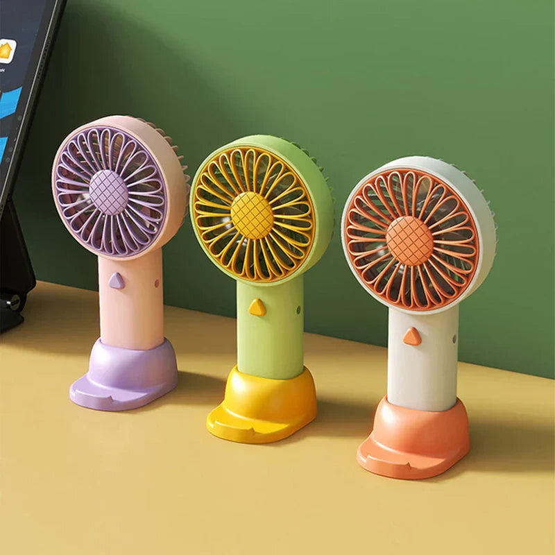 Compact travel fan on a table