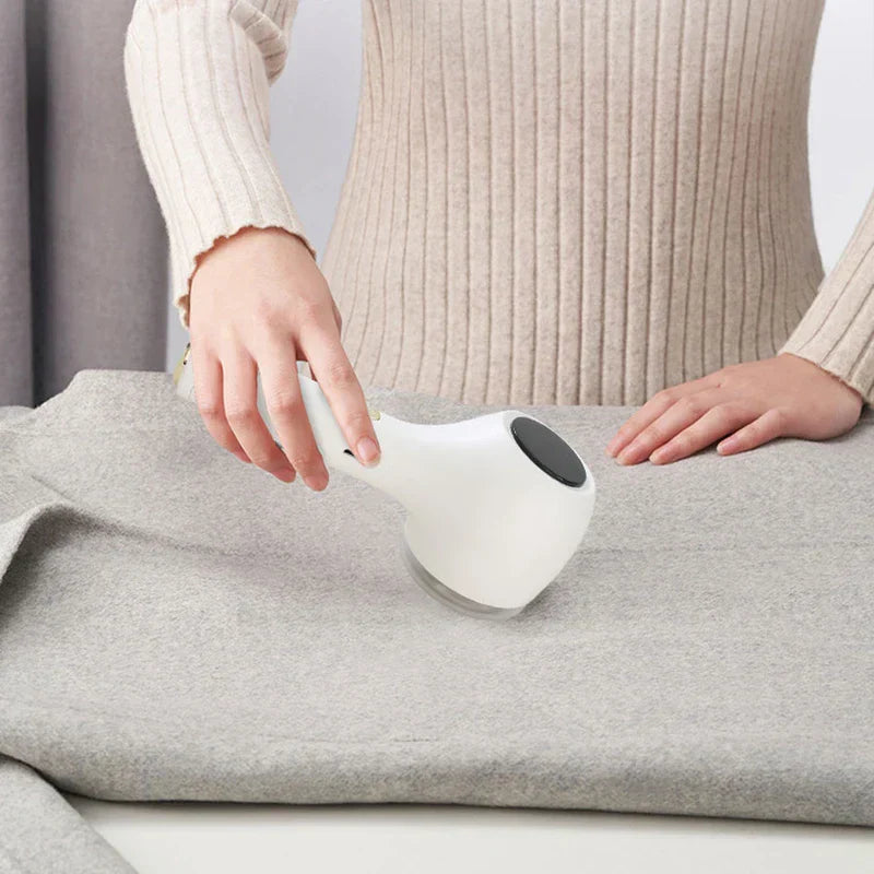 quitapelusas - Primer plano de las cuchillas del removedor de bolitas