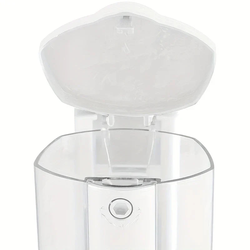 Top view of a foam pump dispenser bottle with its top cap open, exposing the interior liquid reservoir opening.