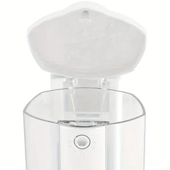 Top view of a foam pump dispenser bottle with its top cap open, exposing the interior liquid reservoir opening.