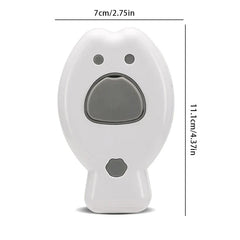 Front view of white fish-shaped cleaning brush with gray accents and size dimensions