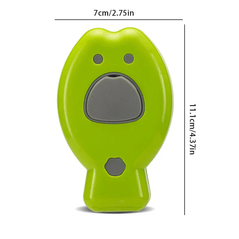 Steamed bun-shaped green cleaning brush with gray details, size labelled 7cm wide and 11.1cm tall