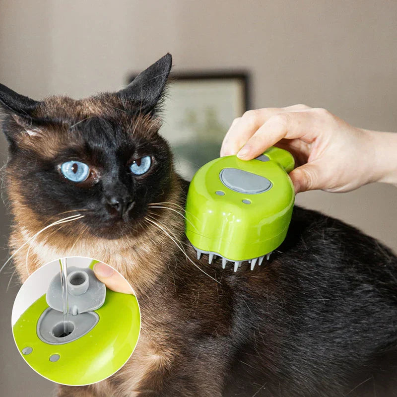 Hand using green pet cleaning brush on a Siamese cat, with inset showing the brush's refill opening