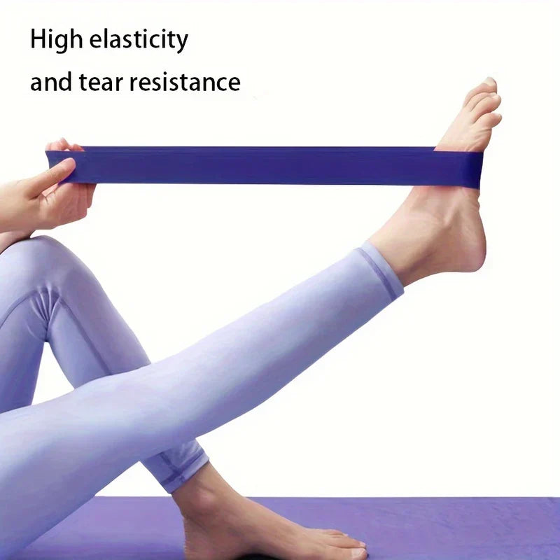 Woman uses a purple resistance loop bands set, pulling the band toward her foot while seated on a yoga mat, high elasticity text visible