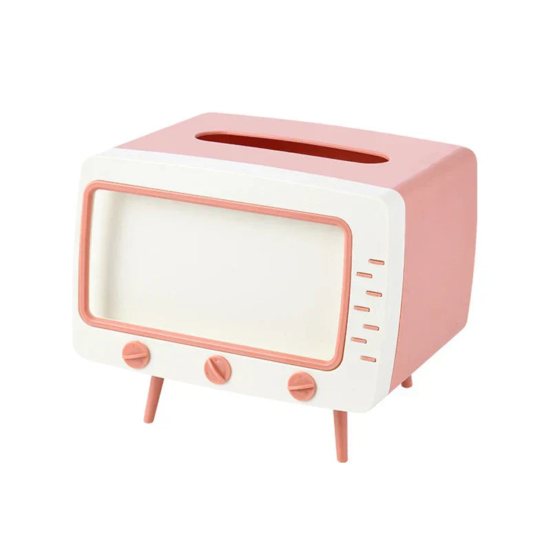 Retro TV-style pink and white tissue box holder with a top tissue slot and decorative front knobs