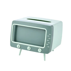Retro television-styled light green and gray tissue box holder with control knobs, side details, short legs, and top tissue slot