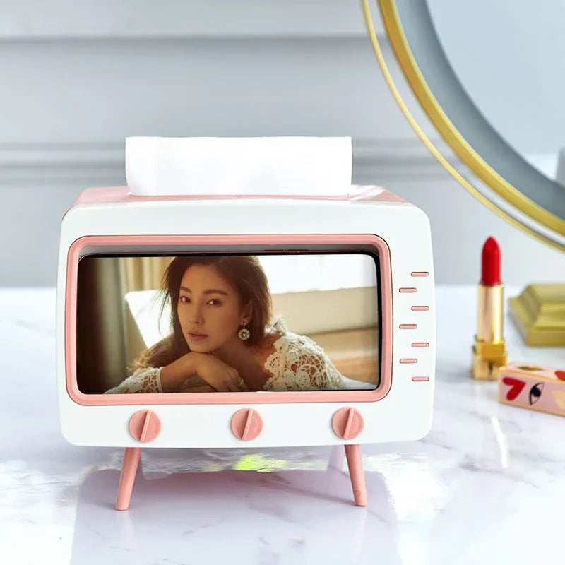 Close-up of retro TV tissue box holder with tissues