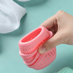 Close-up of reusable laundry cleaning ball in washing machine