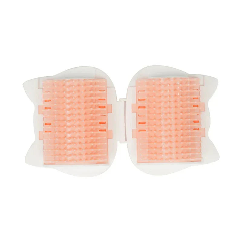 Folded two-panel pet hair remover roller with pink textured pads on white plastic base, top view against white background