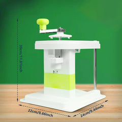 does homegood have rotary cheese grater? White green handheld rotary shredder with height 30cm, base 22cm x 24cm, on wooden surface against green background