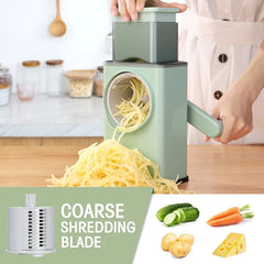 Person using a rotary drum grater to shred potatoes, with a coarse shredding blade and compatible ingredient examples shown