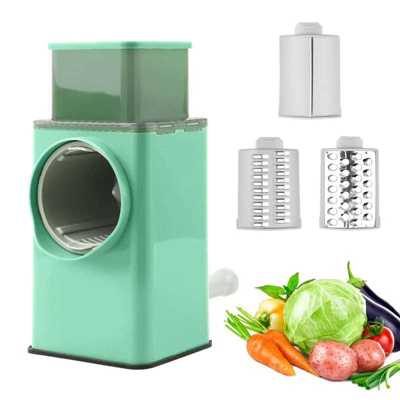 Rotary drum grater with suction base and food pusher
