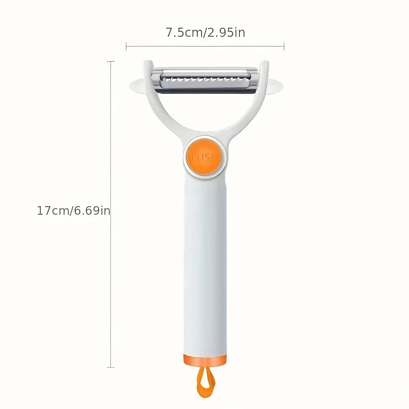 White and orange vegetable peeler with dimensional measurements labeled in centimeters and inches on a plain light background