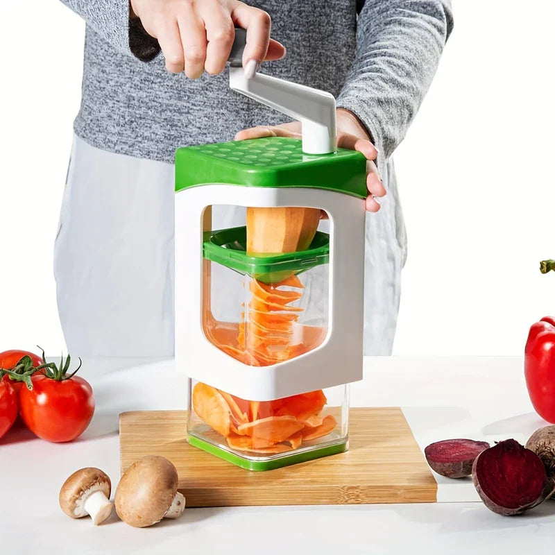 Person using a handheld vegetable slicer to process sweet potato, with fresh produce arranged on the counter around it
