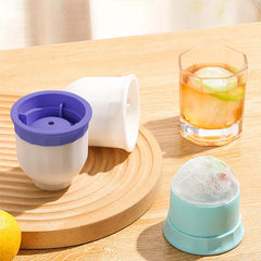 Ice ball maker mold filled with water in a freezer