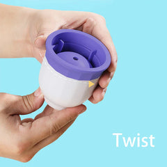 Twisting a two-part ice ball maker by its purple top and white base against a light blue background