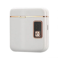 White and rose gold tweezerman nail cutter with power button and digital display on white background