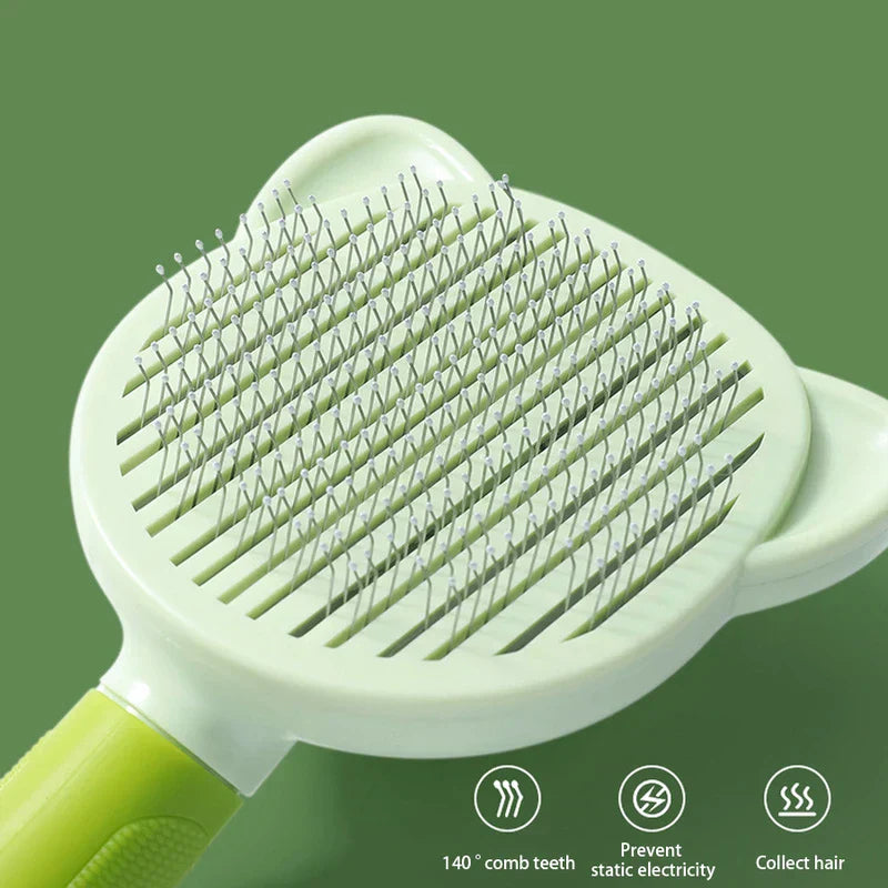 Close-up of a light green pet self cleaning slicker brush with angled wire pin bristles