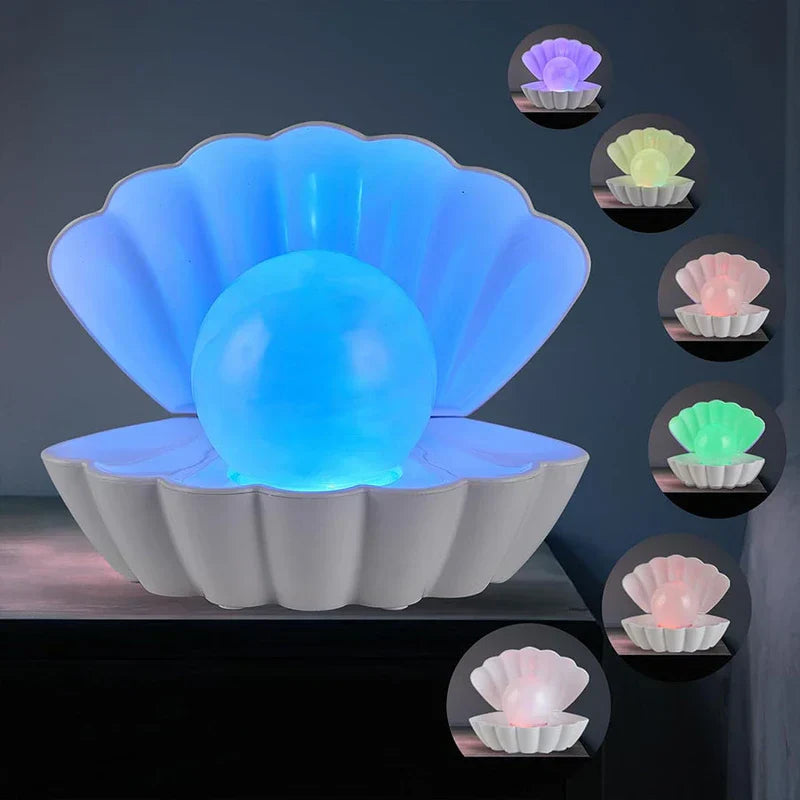 Shell shaped pearl projector night light with soft light patterns