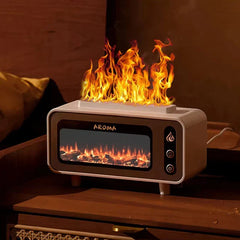 White aroma diffuser & humidifier on a wooden table, showing simulated top orange flames and a fireplace-style front display.